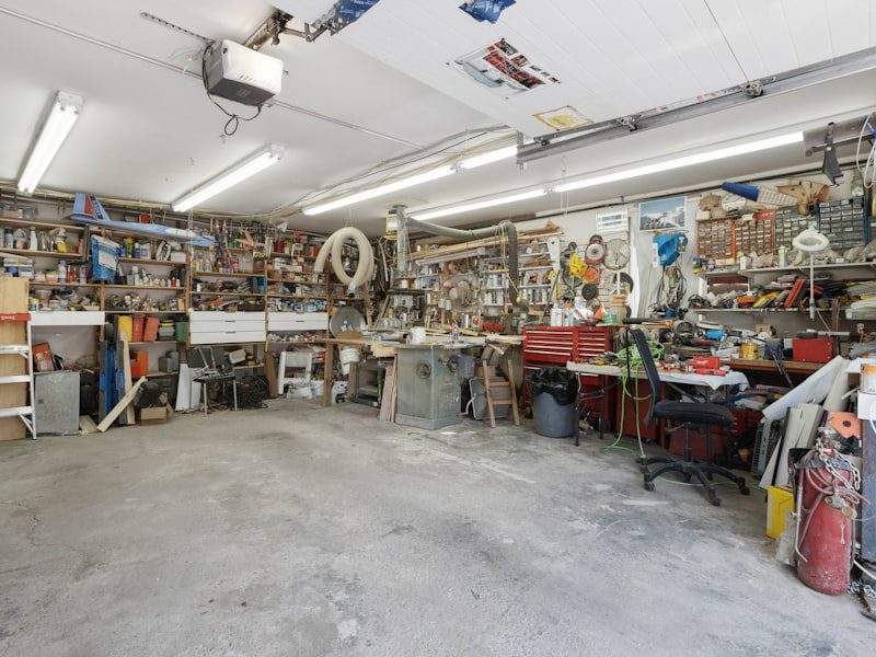 Full garage before cleanout in Costa Mesa, CA